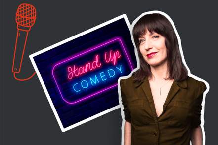 stand up comedian ophira eisenberg stands up in front of a neon sign that says stand up comedy